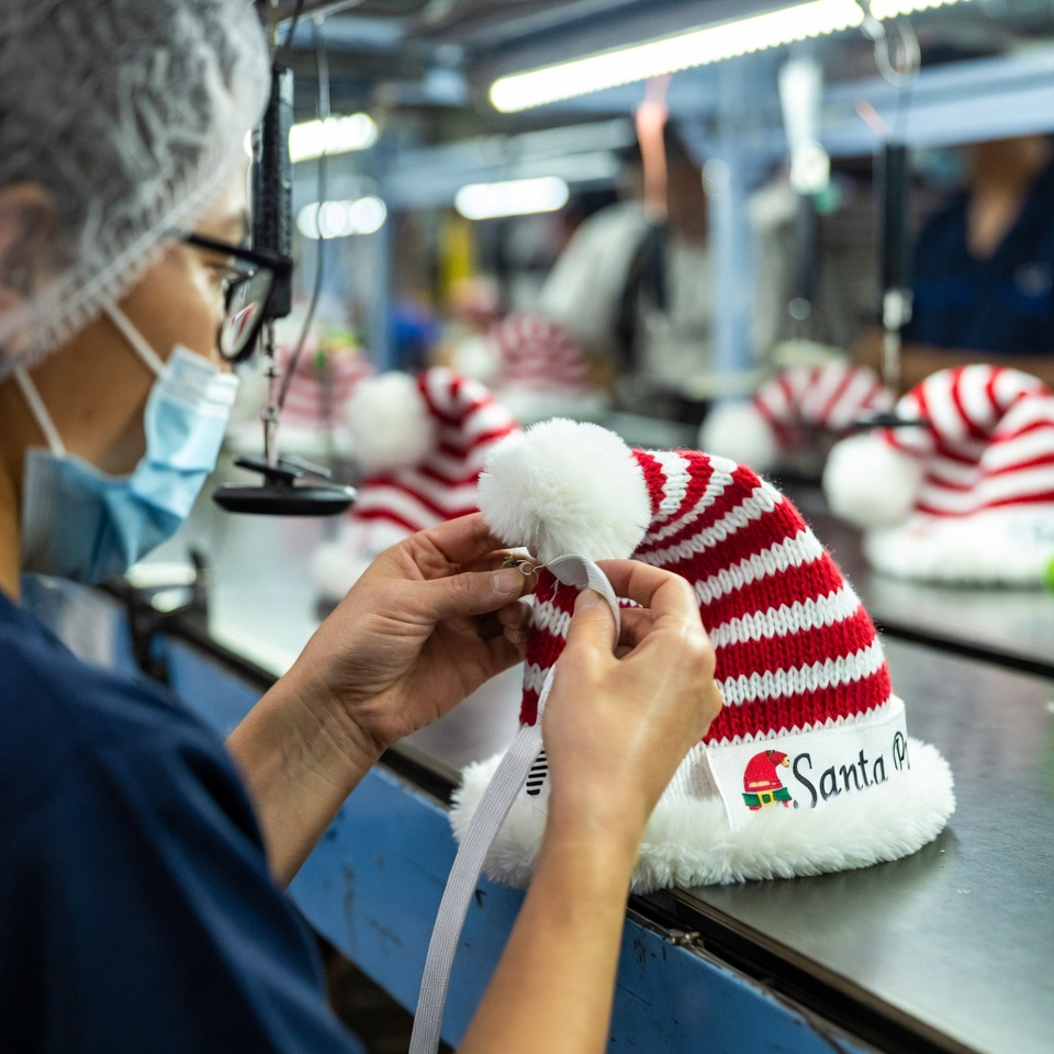 Knitted Striped Dog Wearing Santa Hat for Wholesale