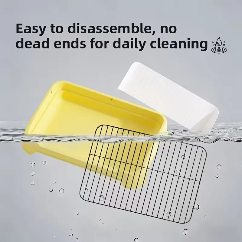 cat sifting litter tray